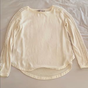 Cream colored long-sleeve top from Loft